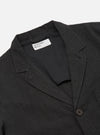 Close-up of the Charcoal Fine Linen Mix Three Button Jacket on a white background, showcasing the fabric texture and button detail.