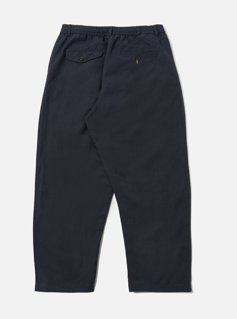 Back view of the Navy Linen Slub Weave Oxford Pant on a white background. The pants have a relaxed fit and visible slub texture.