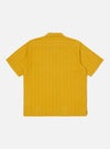 The Mustard Dobby Self Stripe Camper Shirt is displayed on a white background. The shirt is a short-sleeved, mustard-colored shirt with a dobby self stripe pattern.