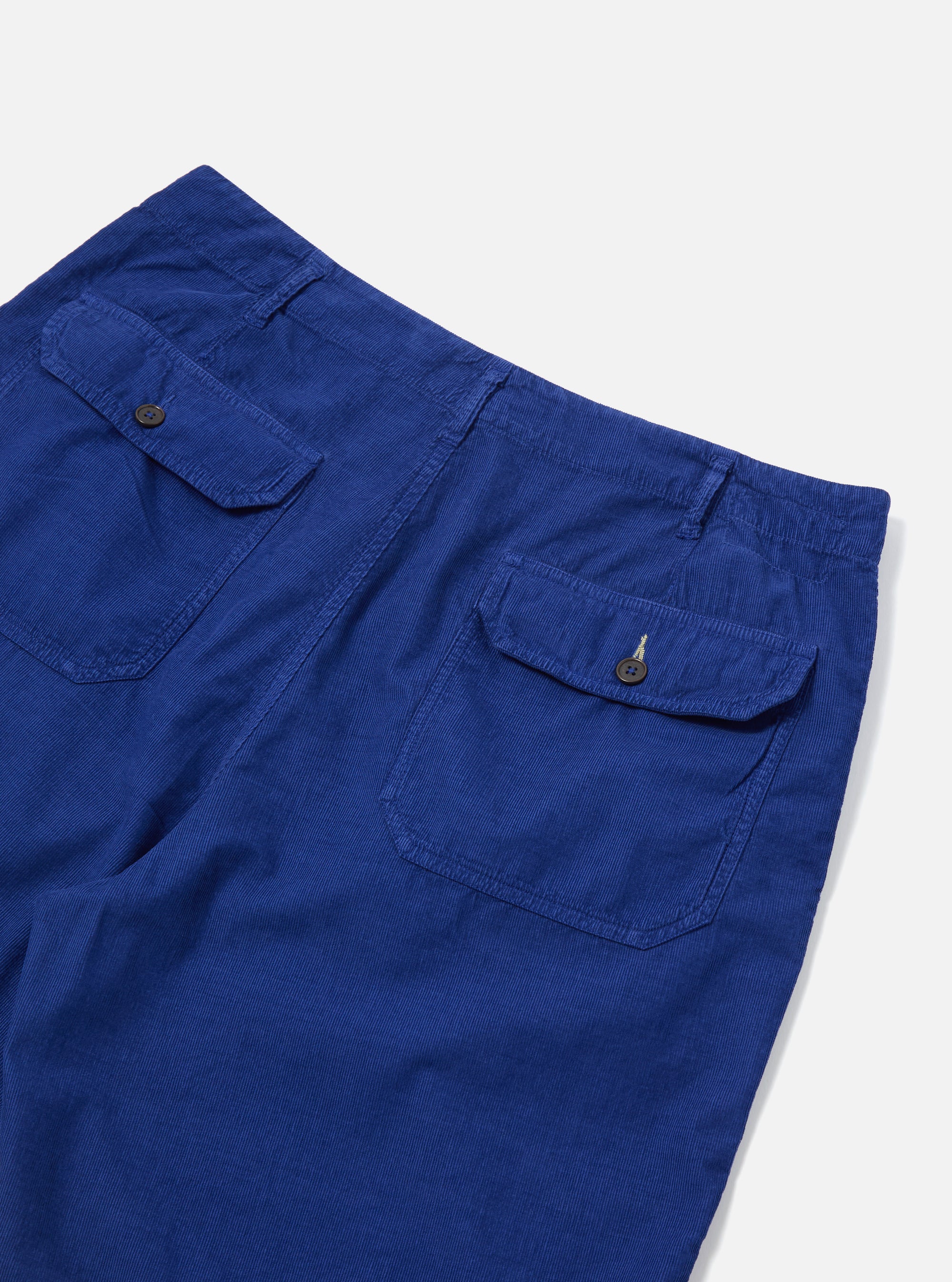 Close-up of the Work Blue Summer Cord Alva Short on a white surface. Shows the texture and pocket details of the blue corduroy fabric.