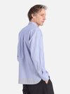 Profile of a model on a white background wearing the Mixed Blue Mixed Classics Patched Lazy Day Shirt. The shirt is light blue with a patched design.