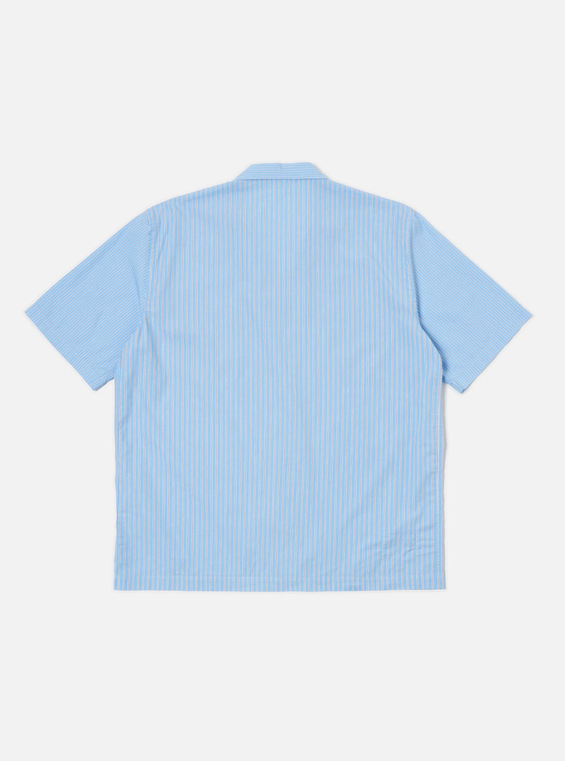 Back view of the Blue Vila Stripes Sal Road Shirt. Light blue with white stripes, short sleeves. Laid flat on a white background.