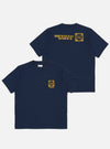 Display of the Navy/Yellow Single Jersey Print Pocket Tee. The tee is navy with yellow print on the pocket and back. The background is a plain white.