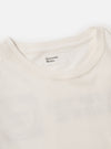Close-up of the Ecru/Red Single Jersey Print Pocket Tee on a white background. The ecru tee has a crew neck and a small tag with the brand name. 