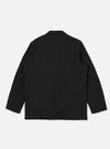 Back view of the Black Organic Canvas Two Button Jacket on a white background. The jacket is made of black canvas material and has a relaxed fit.