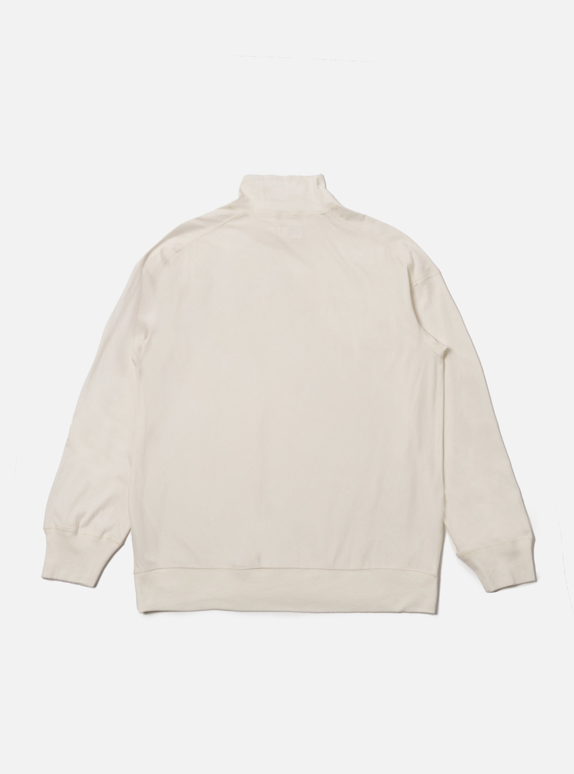 The Ecru Single Jersey Funnel Neck Tee is displayed on a white background. The tee is a light, creamy color and has a relaxed fit. The funnel neck is visible. 