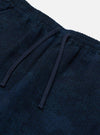 Close-up of Black/Indigo Denim Camo Braga Pant on a white background. Shows the drawstring and textured denim camo pattern.