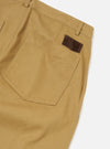 Close-up of the Khaki Works Twill Duke Pant in khaki twill on a white background. Shows back pocket and brown suede tag.