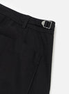 Close-up of the Black Organic Canvas Dutch Pant on a white background, showing the fabric texture and metal buckle detail.