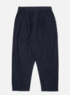 Studio shot of Indigo Brushed Denim Oxford Pant on a white background. The pants are a dark indigo color with a relaxed fit.