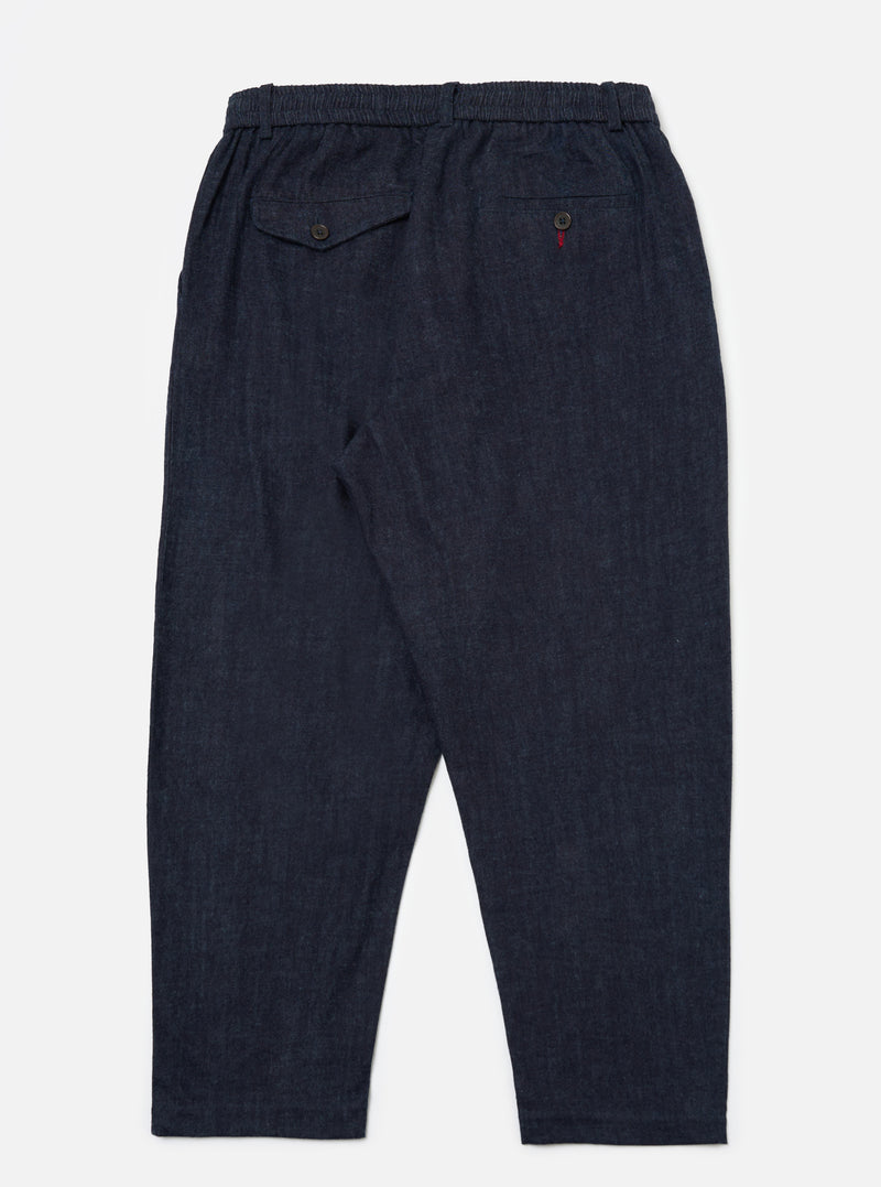 Back view of Indigo Brushed Denim Oxford Pant on a white background. The pants are a relaxed fit with an elastic waistband and buttoned pockets.