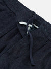 Close-up of the Indigo Brushed Denim Oxford Pant, showcasing the brushed denim texture, elastic waistband, and drawstring on a white background.