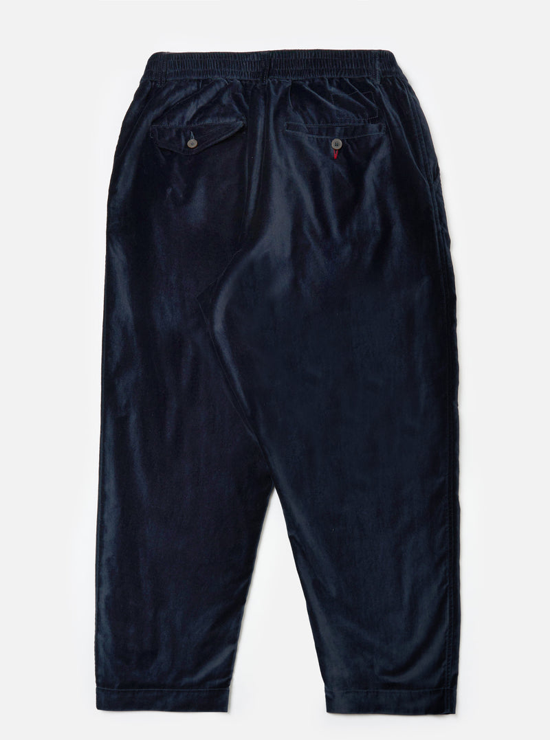Close-up of the back of the Navy Velveteen Oxford Pant on a white background. The pants are a relaxed fit with two back pockets and a comfortable elastic waistband.
