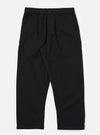 Studio shot of Black Organic Canvas Super Chino pants. The canvas material has a relaxed fit. The background is a clean, bright white.