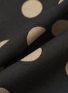 Close-up of the Black Bold Dot Print Rayon Evening Scarf, showcasing the fabric's texture and the bold dot pattern. The scarf is draped to highlight its soft, flowing quality.