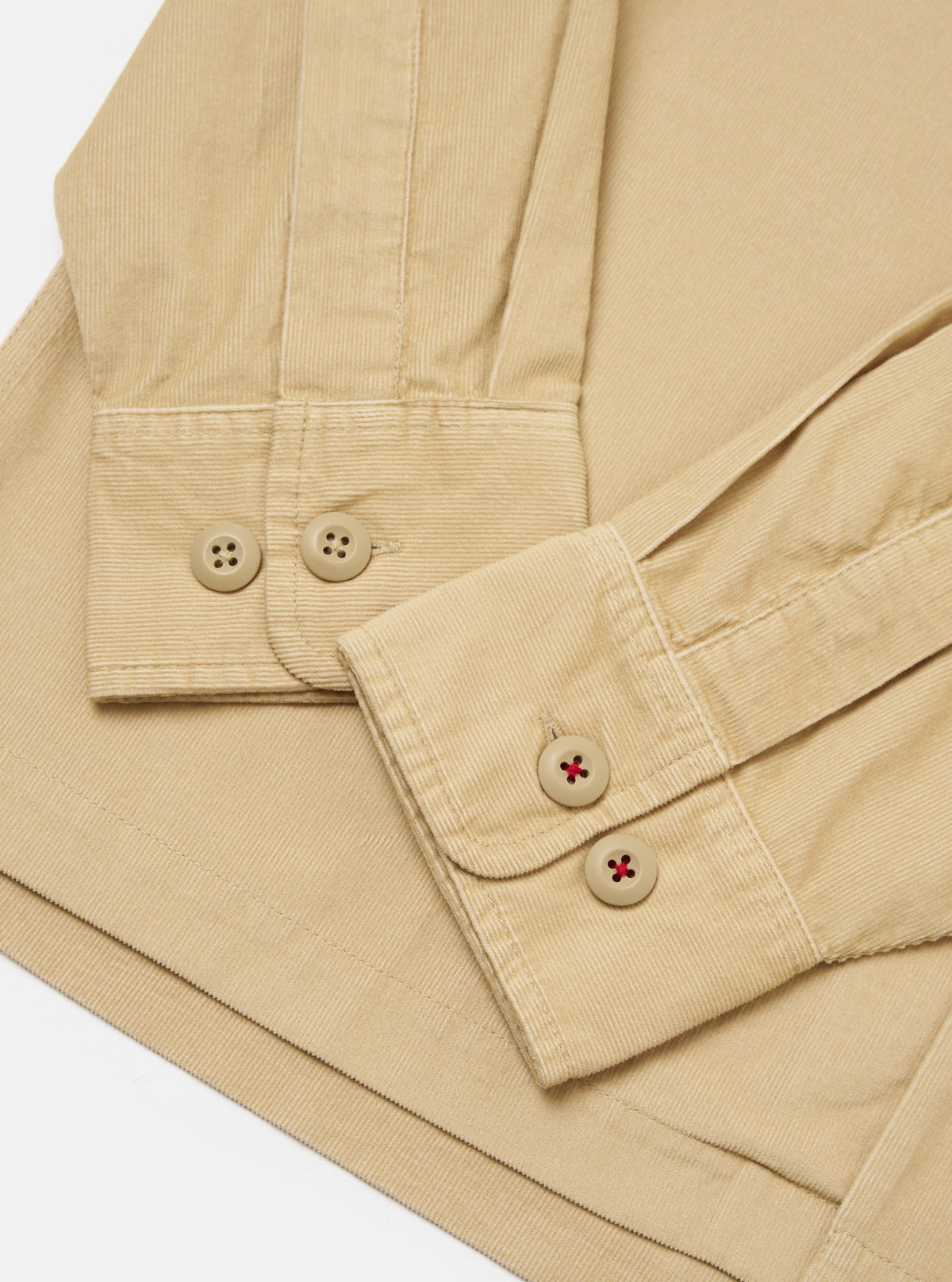 Close-up of the Sand Organic Fine Cord Fatigue Shirt showing the fine corduroy texture, button details, and clean design on a white background.