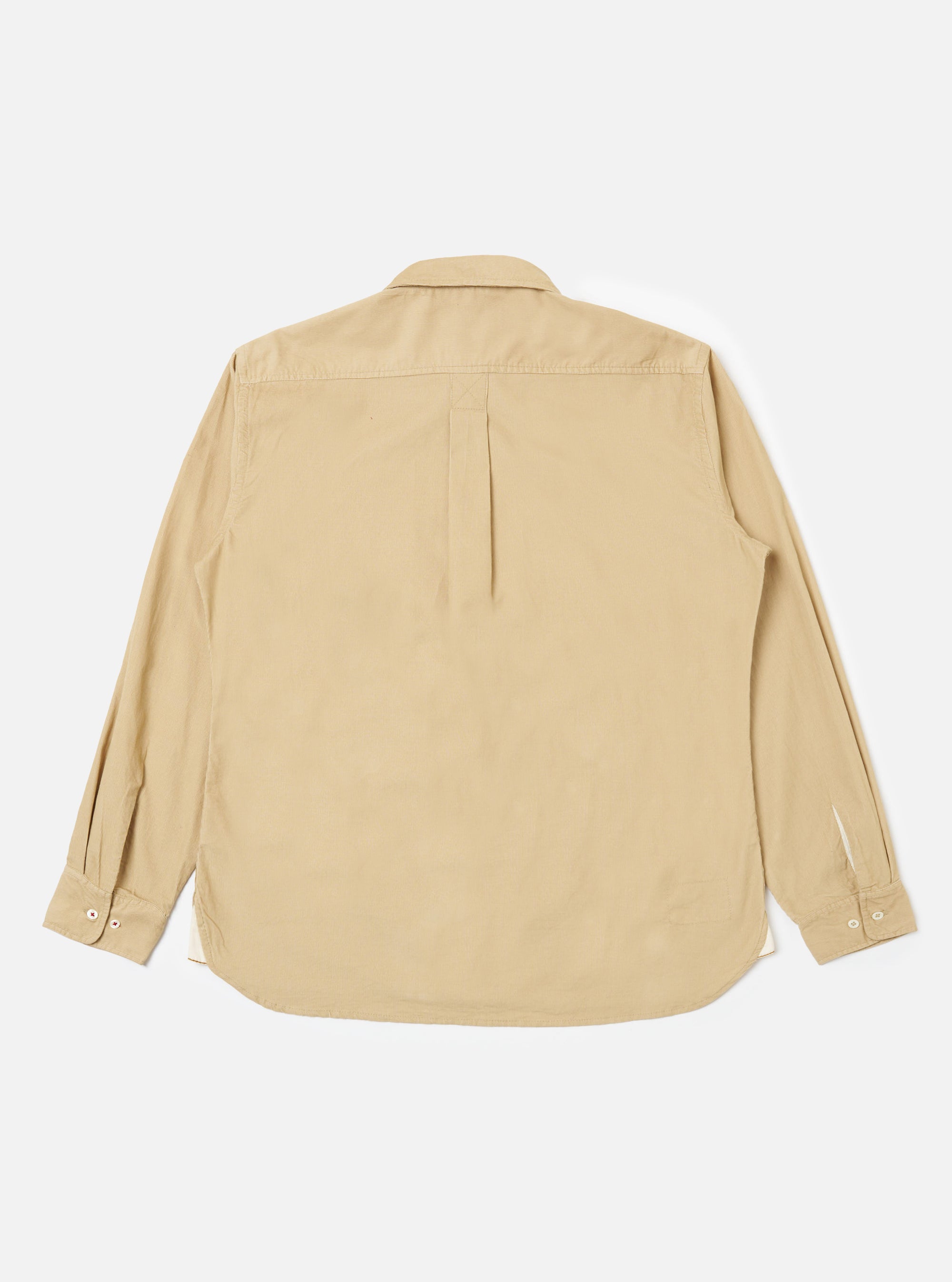 Back view of the Sand Organic Fine Cord Daybrook Shirt on a white background. The shirt is a light tan color and made of fine corduroy material. It has long sleeves and a button-down collar.
