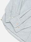 Close-up of the Sky Blue Brushed Organic Cotton Square Pocket Shirt on a white surface, showcasing the sleeve details and fabric texture.