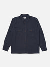 The dark navy Sid Flannel CPO Shirt, a long-sleeved button-down with two chest pockets, is laid flat on a white background. The shirt has brown buttons and a classic fit.