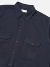 Close-up of the Dark Navy Sid Flannel CPO Shirt on a white background. The flannel shirt features two chest pockets and brown buttons.