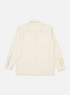 Back view of the Ecru Sid Flannel CPO Shirt, a light-colored, long-sleeved shirt with buttoned cuffs, laid flat on a white background.