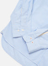 Close-up of the Blue Office Stripe Square Pocket Shirt on a white surface. The light blue and white striped shirt shows the cuff and pocket details.