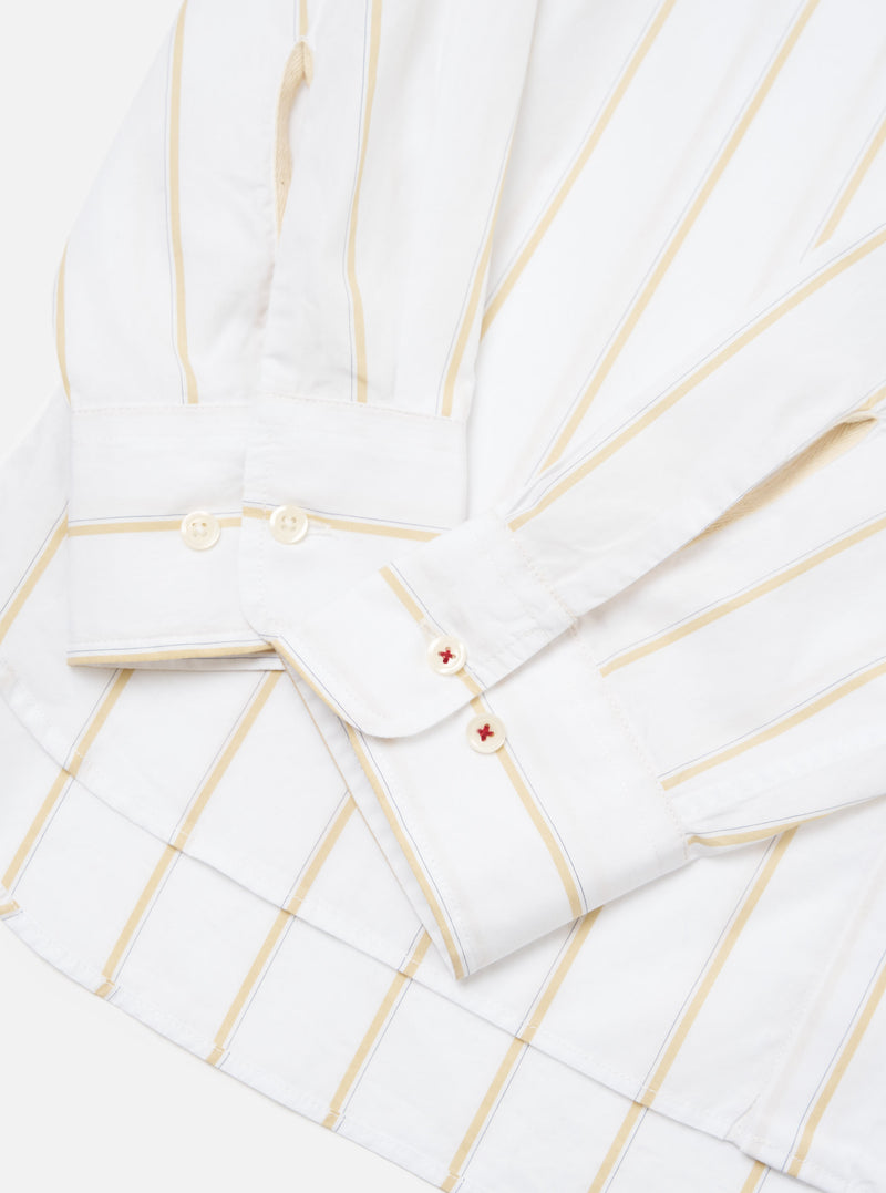 Close-up of the White Office Stripe Square Pocket Shirt on a white surface. The shirt has gold and blue stripes and white buttons.