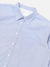 Close-up of the Blue Classic Stripe Lazy Day Shirt on a white background. The shirt is light blue with thin white stripes and has a pocket.