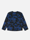 The Blue Flower Fleece Zip Liner Jacket is displayed on a white background. The jacket is black with a blue floral pattern. It's made of fleece and has a zip-up front.