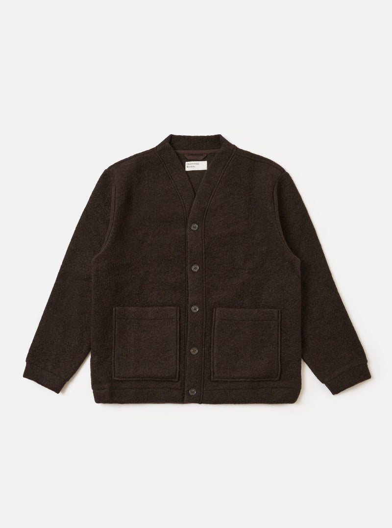 The Brown Wool Fleece Advance Cardigan, in dark brown, is displayed on a white background. The cardigan has a button-up front and two square pockets. The material is a textured wool fleece.