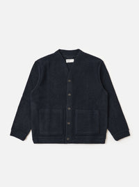 The Navy Wool Fleece Advance Cardigan is displayed on a white background. The cardigan is a dark navy color and made of a soft wool fleece material. It has a relaxed fit and features two front pockets.