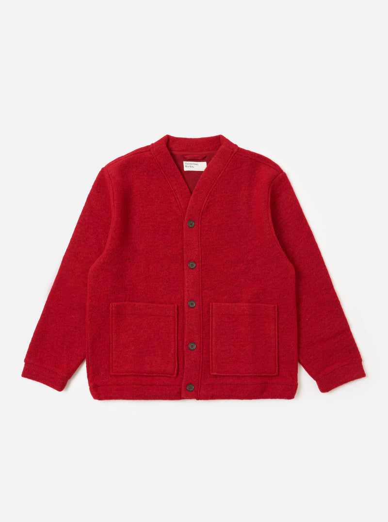 The Red Wool Fleece Advance Cardigan, in red fleece, is laid flat on a white background. It features a button-up front and two square pockets.