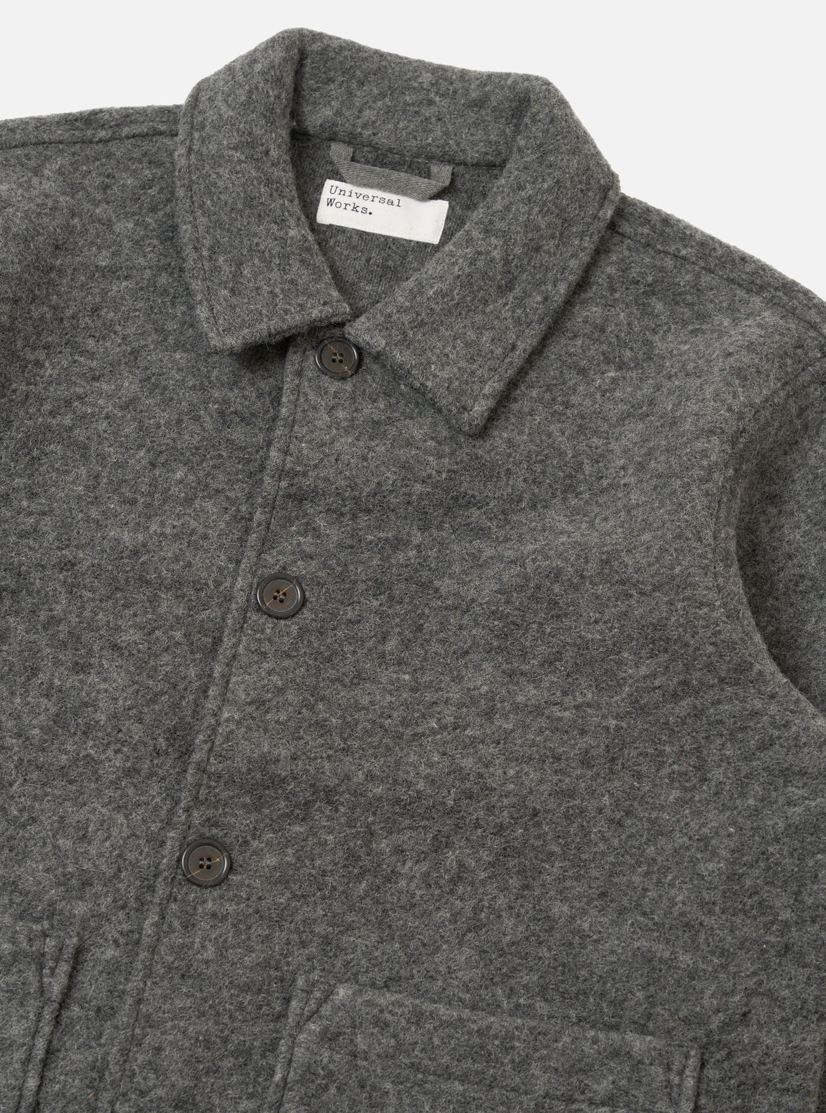 Close-up of the Grey Marl Wool Fleece Rams Jacket on a white background. The wool texture and button details are clearly visible.