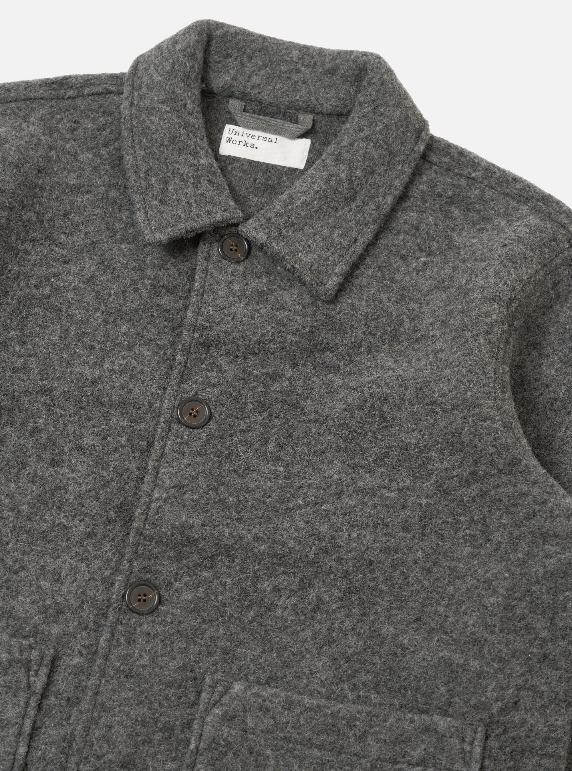 Close-up of the Grey Marl Wool Fleece Rams Jacket on a white background. The wool texture and button details are clearly visible.