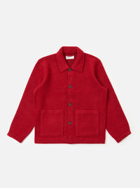 The Red Wool Fleece Rams Jacket on a white background. The jacket is red with dark buttons and two square pockets. The jacket is made of wool fleece.