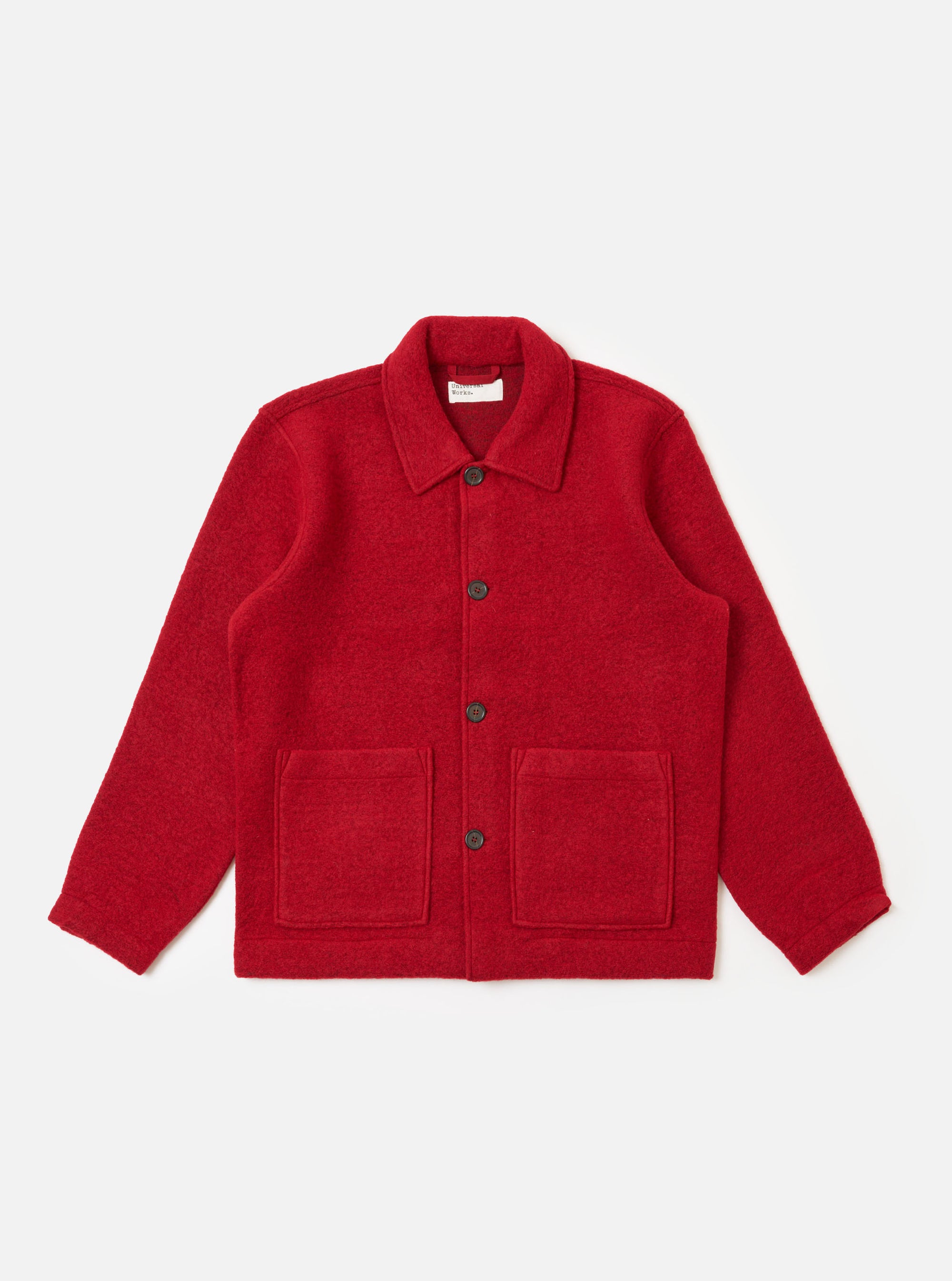 The Red Wool Fleece Rams Jacket on a white background. The jacket is red with dark buttons and two square pockets. The jacket is made of wool fleece.