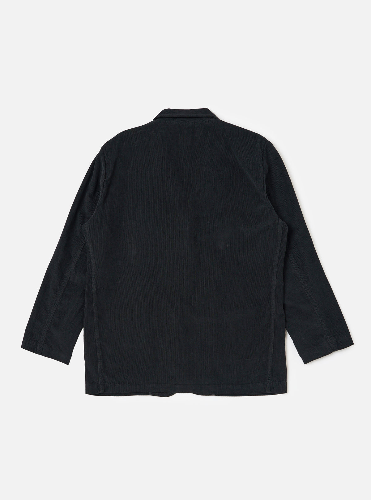 The Black Cat Cord Two Button Jacket in black corduroy, laid flat on a white background. The jacket has a relaxed fit and visible seams.