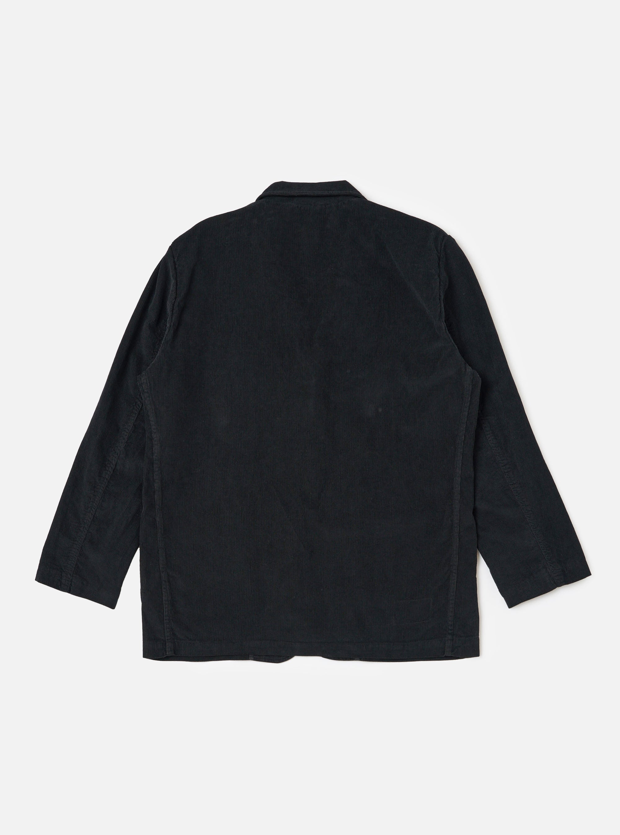The Black Cat Cord Two Button Jacket in black corduroy, laid flat on a white background. The jacket has a relaxed fit and visible seams.