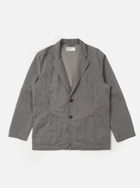 The Mid Grey Linen Slub Weave Two Button Jacket is shown as a flat lay against a white background. The jacket features a notch lapel, a two-button front closure, and two large patch pockets at the waist. The fabric has a visible textured slub weave in a mid-grey tone.