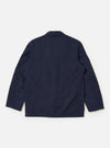 The Navy Linen Slub Weave Two Button Jacket is shown from the back as a flat lay against a plain white background. The image highlights the jacket's structured rear construction, featuring two back vents and the distinct irregular texture of the navy linen-blend fabric.