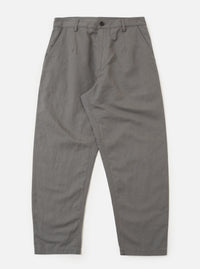 The Mid Grey Linen Slub Weave Dizzy Trouser is presented as a flat lay against a plain white background. The trousers feature a wide-leg, loose silhouette and a structured waistband with belt loops. The mid-grey fabric displays a distinct, textured slub weave.