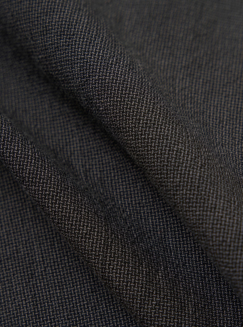 A close-up fabric swatch of the charcoal grey Seattle cotton material used for the OG Bakers Jacket. The image highlights the textured weave and solid color of the fabric.