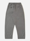 The Mid Grey Linen Slub Weave Oxford Pant is shown from the back as a flat lay against a plain white background. The trousers feature an elasticated waistband and rear patch pockets, highlighting the simple construction of the back. The mid-grey fabric has a distinct slubby texture characteristic of the linen-cotton weave.