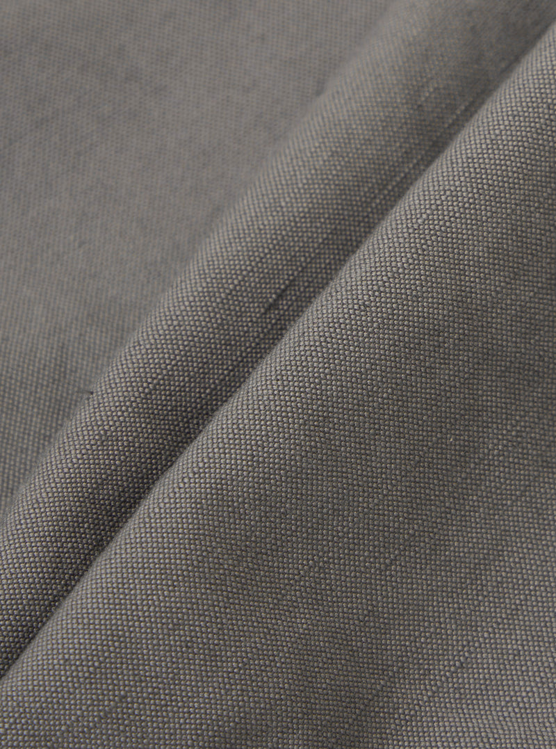 A close-up swatch image of the Mid Grey Linen Slub Weave Oxford Pant fabric displays a mid-grey color with a distinct, textured slub weave pattern. The natural irregularities of the linen fibers are visible across the surface of the material.
