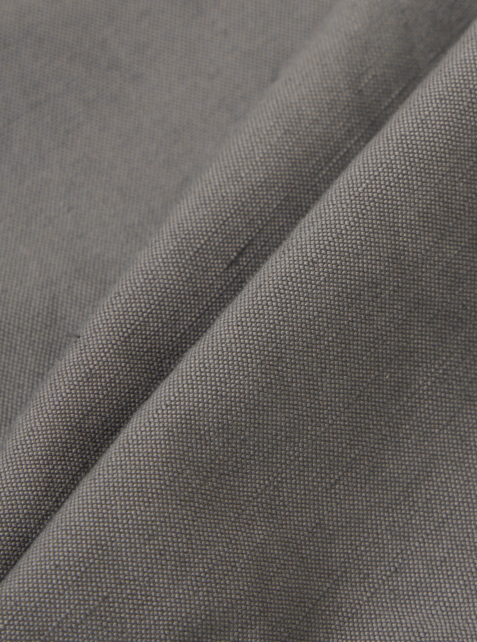 A close-up swatch image of the Mid Grey Linen Slub Weave Oxford Pant fabric displays a mid-grey color with a distinct, textured slub weave pattern. The natural irregularities of the linen fibers are visible across the surface of the material.