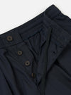 The Navy Broadcloth Oxford Pant is displayed flat against a plain white background. The trousers feature a wide-leg silhouette, a pleated front, and an adjustable drawstring at the waistband.