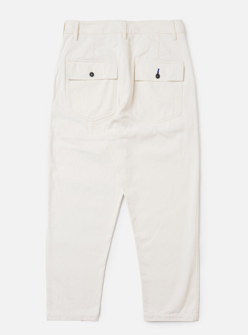 The back of the Ecru Slub Drill Dizzy Trouser is displayed flat against a plain white background. The image highlights the wide-leg cut and the ecru-colored slub cotton fabric. Two large patch pockets are visible on the rear of the trousers.