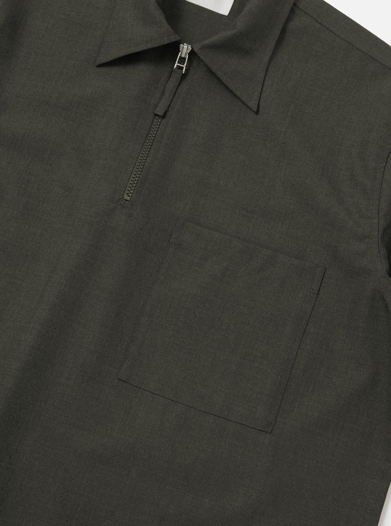 An Olive Marl Tropical Suiting Ewan Shirt is shown from the back, displayed flat against a plain white background. The image highlights the short sleeves, a straight hem, and a horizontal yoke across the shoulders.