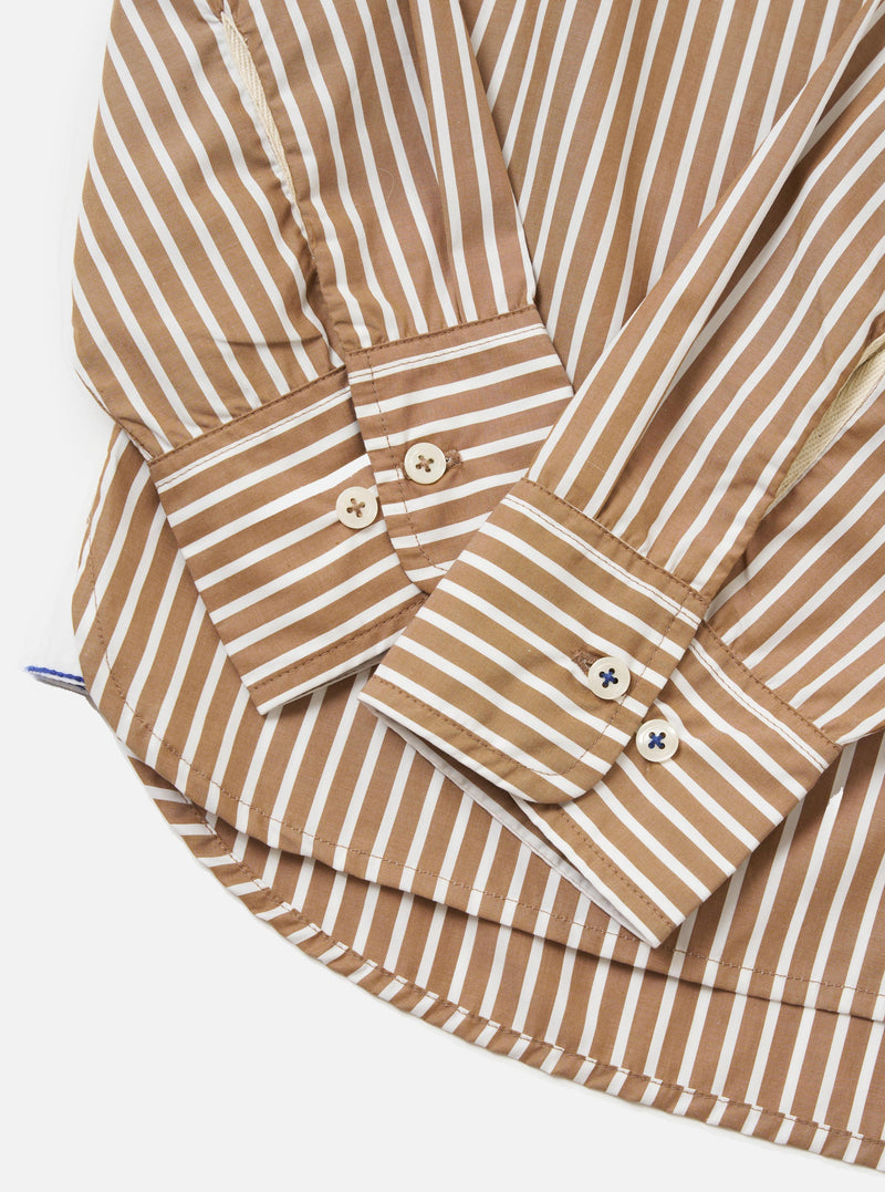The back of the Brown/White Cotton Stripe Square Pocket Shirt is shown laid flat against a solid white background. The image highlights the vertical brown and white stripes, a horizontal back yoke, and a central box pleat designed for a relaxed fit.