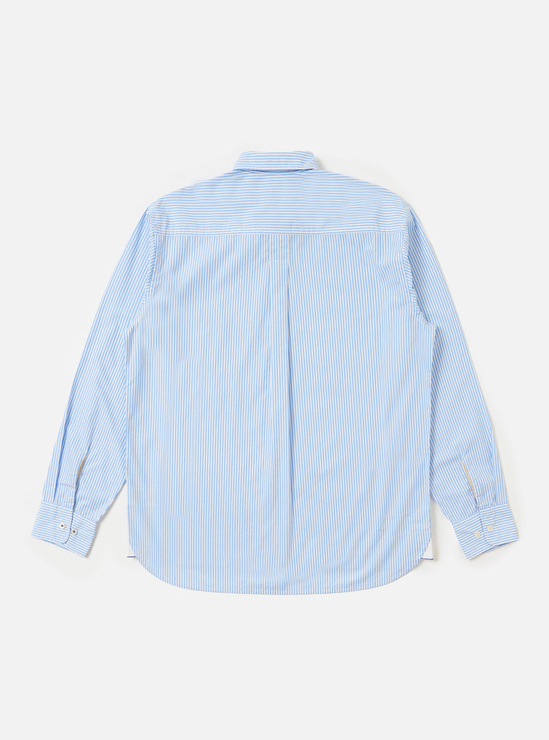 The back of the Sky/White Classic Nipon Stripe Lazy Day Shirt is displayed flat against a plain white background. The image highlights the horizontal back yoke and a central box pleat, showcasing the shirt's relaxed construction and the fine sky blue and white vertical stripes.